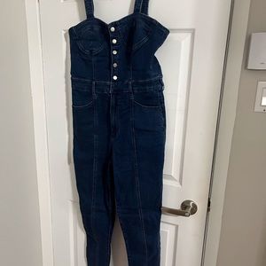 A guess denim jumpsuit , size 31